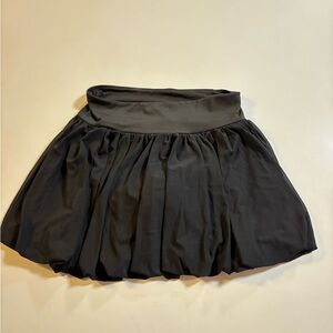 Black bubble tennis skirt. With built in shorts